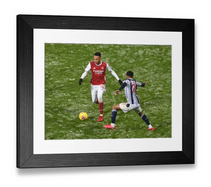 Framed Print : Arsenal's Aubameyang Faces Off Against West Brom's Furlong in Premier League Clash