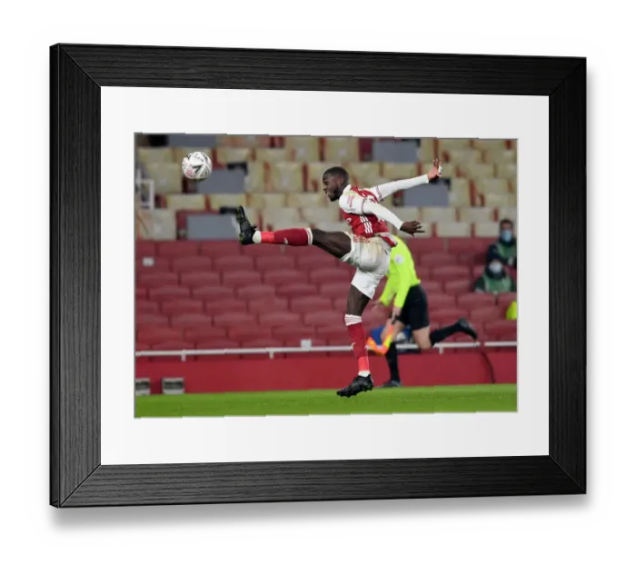 Framed Print : Arsenal's Nicolas Pepe in Action against Newcastle United - FA Cup Third Round