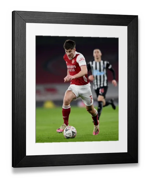 Framed Print : Arsenal's Kieran Tierney in Action Against Newcastle United in FA Cup Match Framed Print : Arsenal's Kieran Tierney in Action Against Newcastle United in FA Cup Match