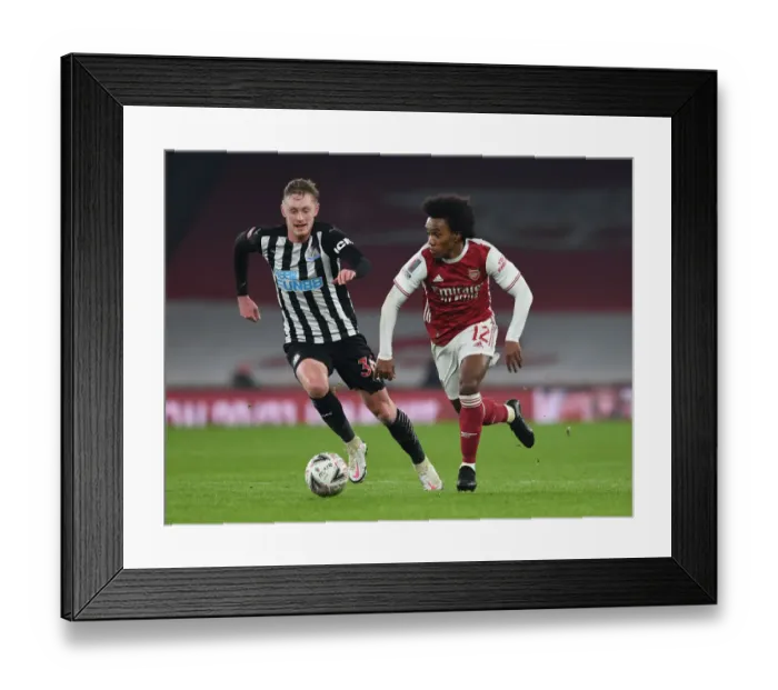 Framed Print : Arsenal vs Newcastle United: Willian Clashes with Longstaff in FA Cup Third Round