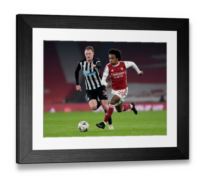 Framed Print : Willian vs Longstaff: Clash of Midfield Titans in Arsenal vs Newcastle FA Cup Showdown