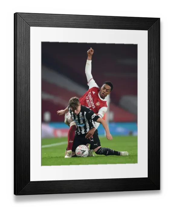 Framed Print : FA Cup Showdown: Willock vs Ritchie's Intense Battle - Arsenal vs Newcastle United