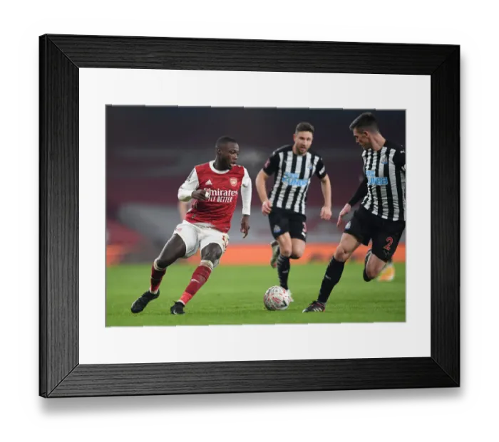 Framed Print : Arsenal's Nicolas Pepe in Action during FA Cup Clash against Newcastle United Framed Print : Arsenal's Nicolas Pepe in Action during FA Cup Clash against Newcastle United