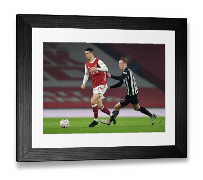 Framed Print : Arsenal vs Newcastle United: Granit Xhaka vs Sean Longstaff Clash in FA Cup Third Round Framed Print : Arsenal vs Newcastle United: Granit Xhaka vs Sean Longstaff Clash in FA Cup Third Round