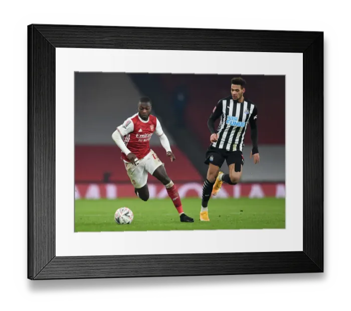 Framed Print : Arsenal vs Newcastle United: Nicolas Pepe vs Joelinton Clash in FA Cup Third Round Framed Print : Arsenal vs Newcastle United: Nicolas Pepe vs Joelinton Clash in FA Cup Third Round