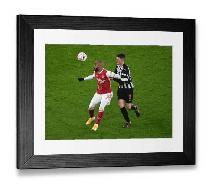 Framed Print : FA Cup Clash: Lacazette vs. Clark - Arsenal vs. Newcastle Showdown