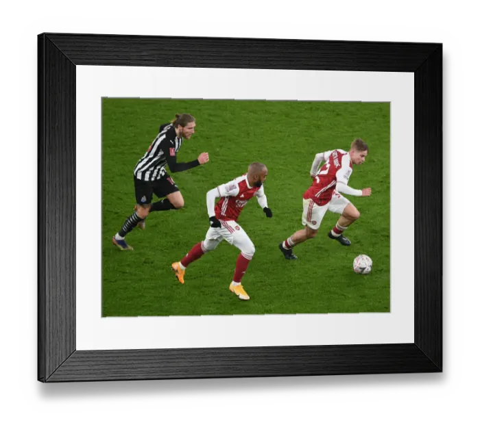 Framed Print : Arsenal's Smith Rowe and Lacazette Sprint Past Newcastle's Hendrick in FA Cup Clash
