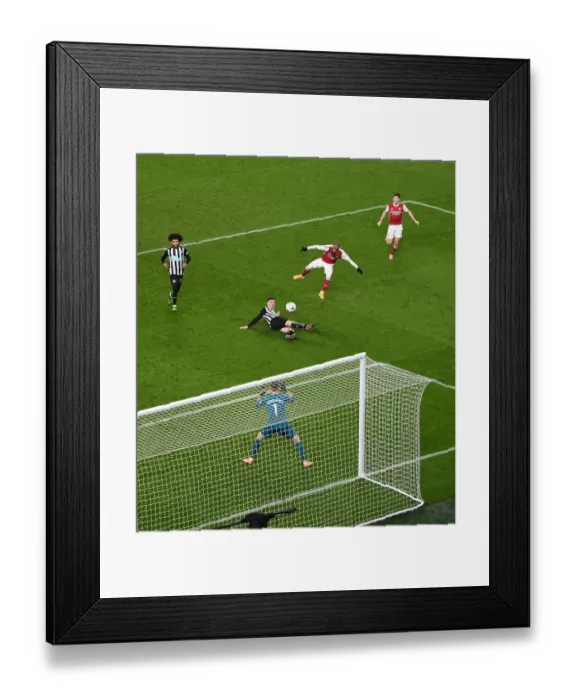 Framed Print : Arsenal's Lacazette Aims for FA Cup Upset Against Newcastle