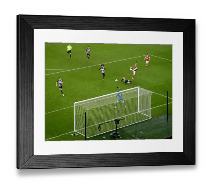 Framed Print : Arsenal's Lacazette Takes Aim in FA Cup Clash Against Newcastle