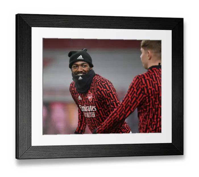 Framed Print : Arsenal's Ainsley Maitland-Niles Warming Up: Arsenal v Crystal Palace, Emirates Stadium (Behind Closed Doors), Premier League 2021