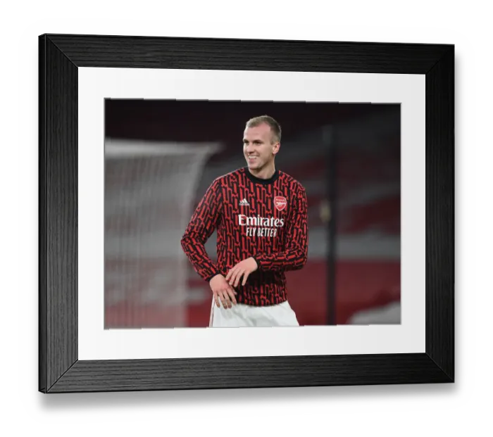 Framed Print : Arsenal's Rob Holding Prepares for Crystal Palace Clash in Empty Emirates Stadium (Arsenal v Crystal Palace, 2021-22 Premier League)