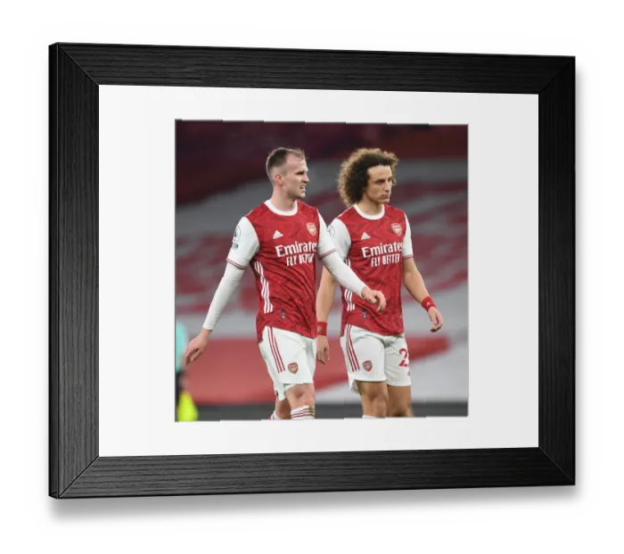 Framed Print : Arsenal's Holding and Luiz: Emirates Stadium Showdown Amidst Empty Seats (Arsenal v Crystal Palace, Premier League 2021)