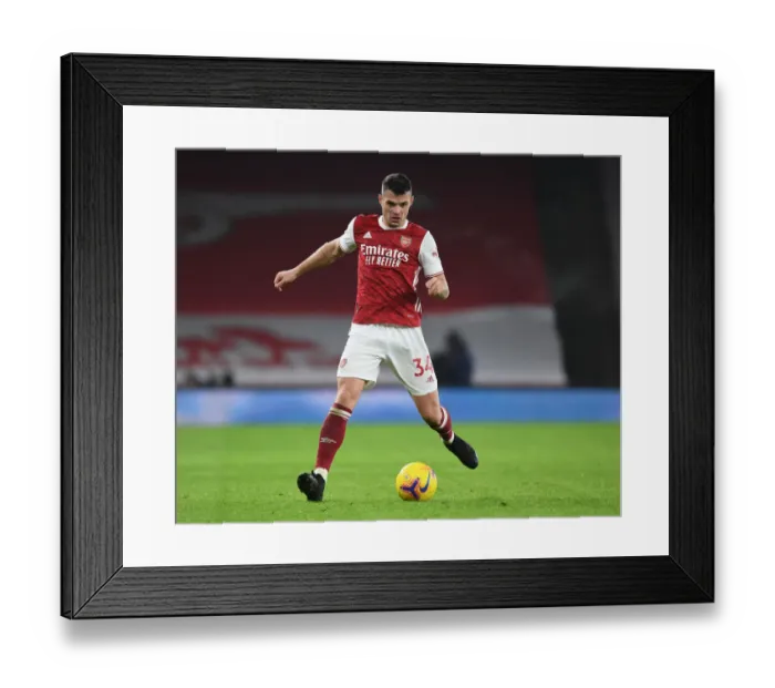 Framed Print : Granit Xhaka: Arsenal Star Shines at Empty Emirates in Premier League Clash vs. Crystal Palace (2020-21)