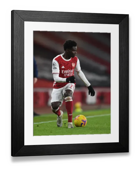 Framed Print : Arsenal's Bukayo Saka Shines at Empty Emirates in Arsenal vs Crystal Palace, Premier League 2020-21 Framed Print : Arsenal's Bukayo Saka Shines at Empty Emirates in Arsenal vs Crystal Palace, Premier League 2020-21