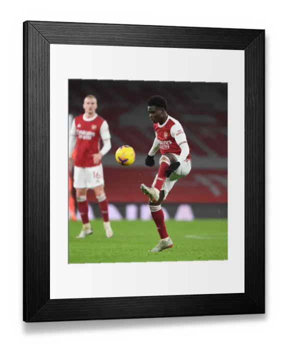 Framed Print : Bukayo Saka's Standout Performance at Empty Emirates: Arsenal vs Crystal Palace (2020-21)