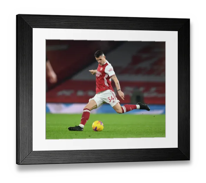 Framed Print : Granit Xhaka: Arsenal's Midfield Maestro Shines at Empty Emirates Stadium vs. Crystal Palace (2020-21)