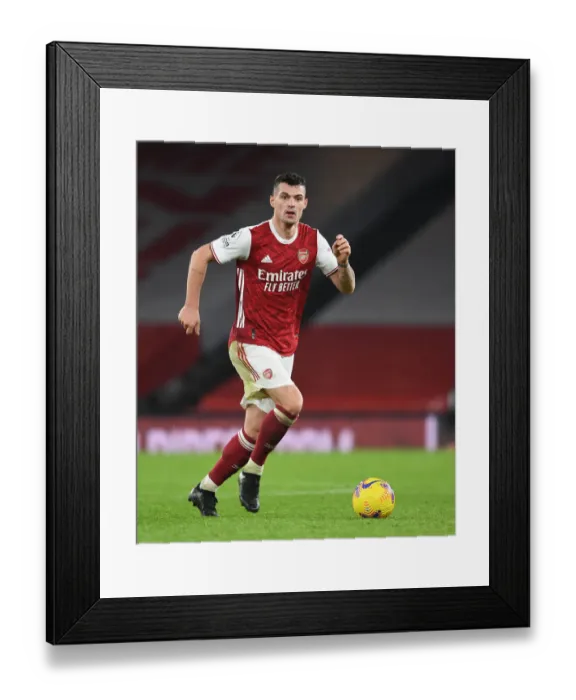 Framed Print : Arsenal's Granit Xhaka in Action Against Crystal Palace in Empty Emirates Stadium (2020-21)