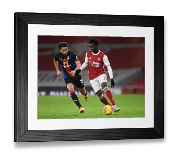 Framed Print : Arsenal vs Crystal Palace: Bukayo Saka in Action at Emirates Stadium Amidst Empty Seats (2020-21)