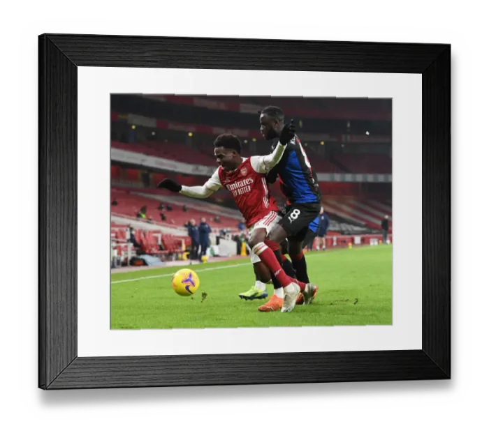 Framed Print : Empty Battle: Saka vs Kouyate - Arsenal vs Crystal Palace, Emirates Stadium