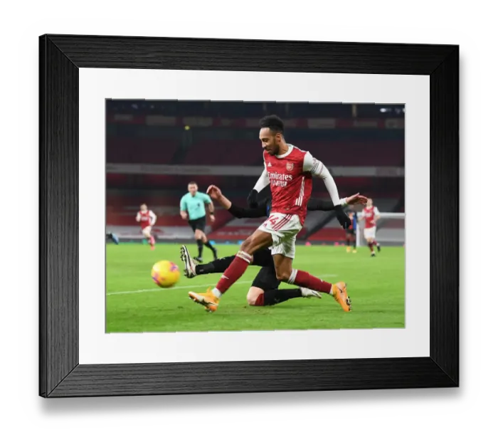 Framed Print : Arsenal's Aubameyang Shines Alone: A Beacon in Empty Emirates During Arsenal vs. Crystal Palace Match