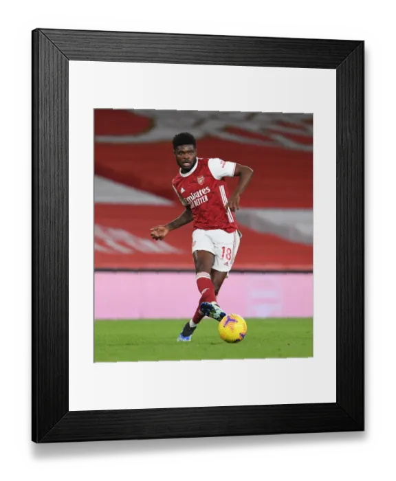 Framed Print : Thomas Partey in Action: Arsenal vs. Newcastle United - Premier League 2021 (Behind Closed Doors) Framed Print : Thomas Partey in Action: Arsenal vs. Newcastle United - Premier League 2021 (Behind Closed Doors)