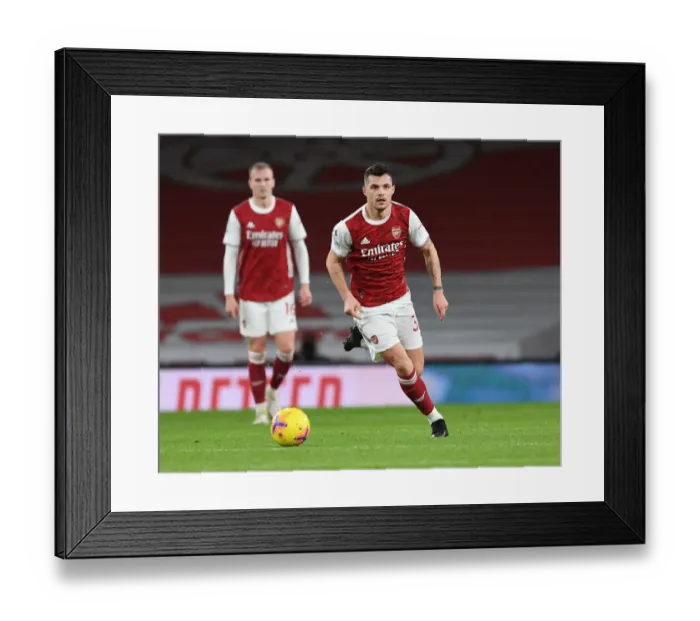 Framed Print : Arsenal's Granit Xhaka in Action at Empty Emirates Stadium: Arsenal v Newcastle United, Premier League 2020-21 Framed Print : Arsenal's Granit Xhaka in Action at Empty Emirates Stadium: Arsenal v Newcastle United, Premier League 2020-21