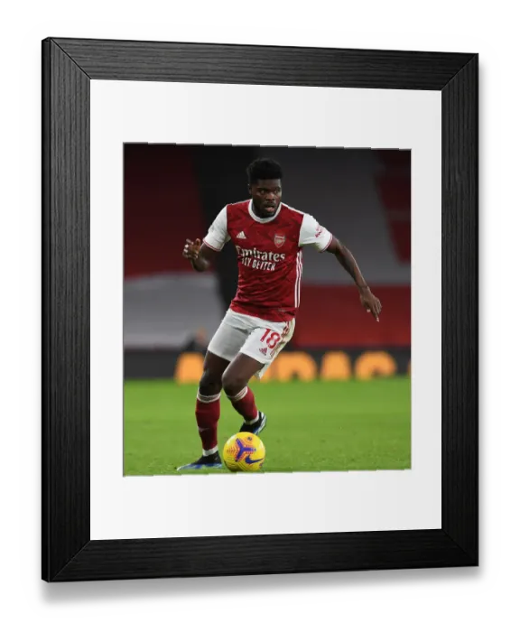 Framed Print : Thomas Partey in Action: Arsenal vs. Newcastle United - Premier League 2021 (Behind Closed Doors) Framed Print : Thomas Partey in Action: Arsenal vs. Newcastle United - Premier League 2021 (Behind Closed Doors)