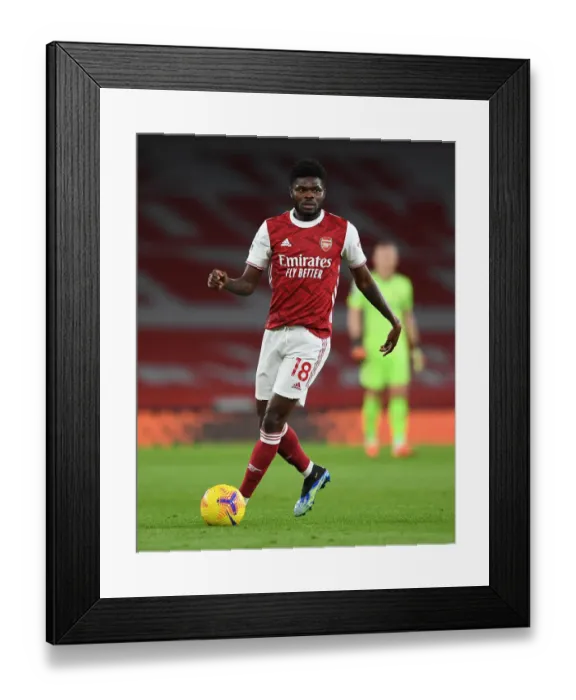 Framed Print : Thomas Partey in Action: Arsenal vs. Newcastle United (Empty Emirates Stadium, Premier League 2021) Framed Print : Thomas Partey in Action: Arsenal vs. Newcastle United (Empty Emirates Stadium, Premier League 2021)