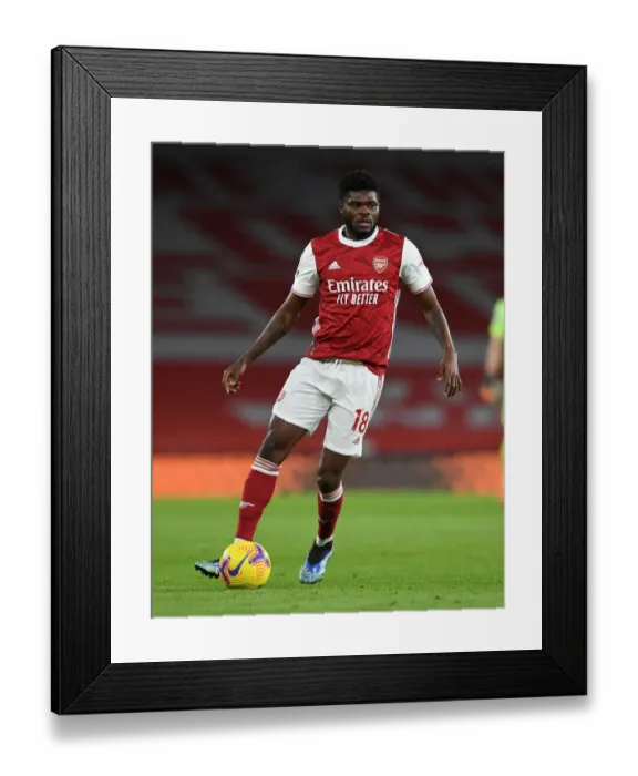 Framed Print : Thomas Partey in Action: Arsenal vs. Newcastle United (2020-21) - Emirates Stadium (Behind Closed Doors)