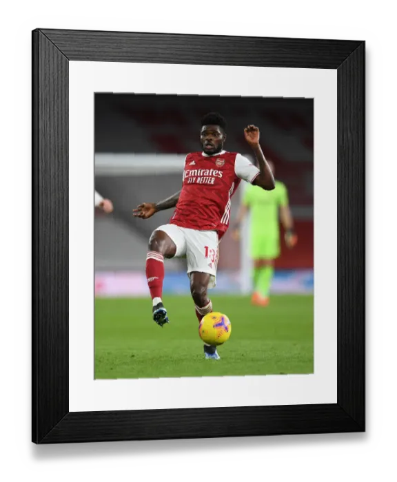 Framed Print : Thomas Partey in Action: Arsenal vs. Newcastle United (2020-21) - Emirates Stadium (Behind Closed Doors) Framed Print : Thomas Partey in Action: Arsenal vs. Newcastle United (2020-21) - Emirates Stadium (Behind Closed Doors)