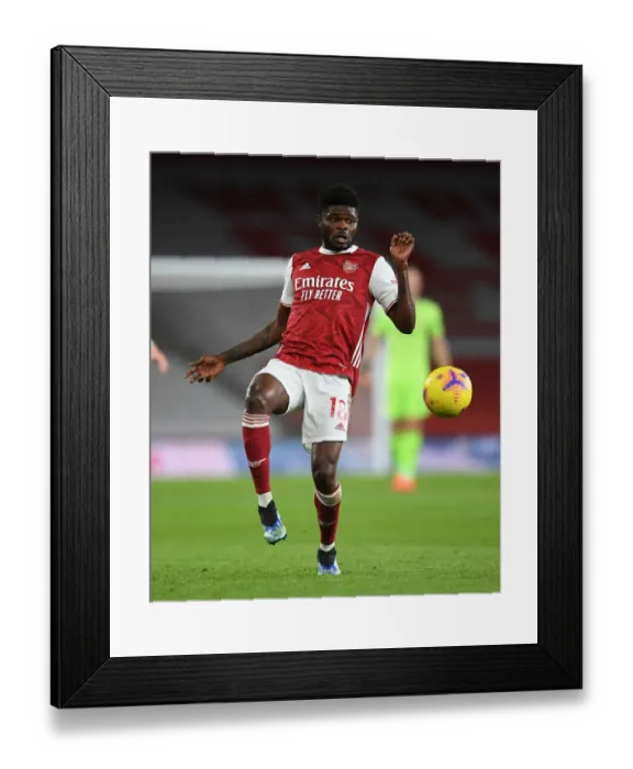 Framed Print : Thomas Partey in Action: Arsenal vs. Newcastle United (2020-21) - Emirates Stadium (Behind Closed Doors) Framed Print : Thomas Partey in Action: Arsenal vs. Newcastle United (2020-21) - Emirates Stadium (Behind Closed Doors)