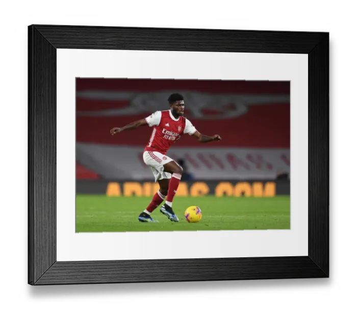 Framed Print : Thomas Partey in Action: Arsenal vs Newcastle United (Premier League 2021, Emirates Stadium) - Behind Closed Doors