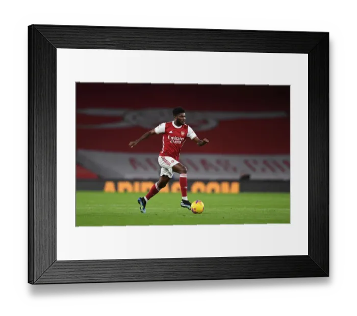 Framed Print : Thomas Partey in Action: Arsenal vs. Newcastle United (2020-21) - Emirates Stadium (Behind Closed Doors)