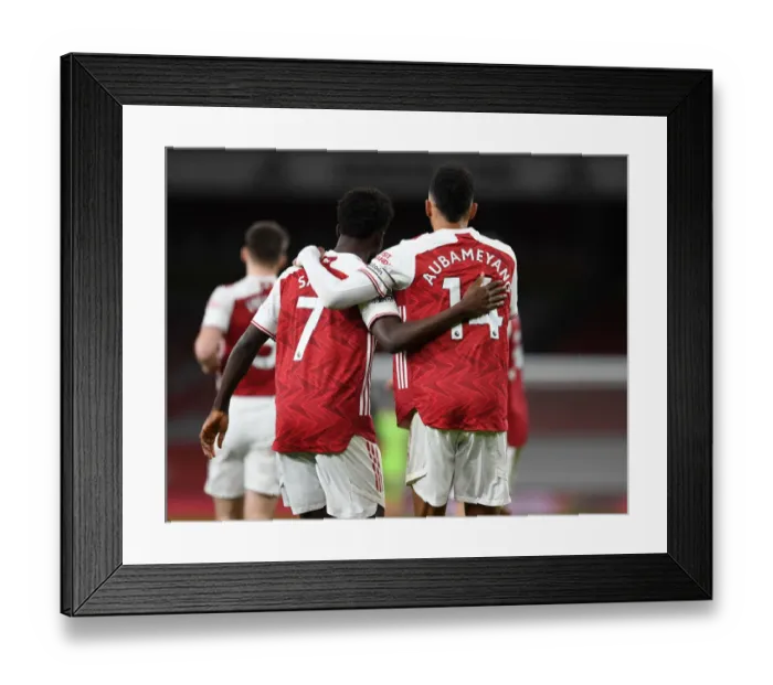 Framed Print : Arsenal's Aubameyang and Saka Celebrate First Goal in Empty Emirates Stadium Against Newcastle United (2021) Framed Print : Arsenal's Aubameyang and Saka Celebrate First Goal in Empty Emirates Stadium Against Newcastle United (2021)