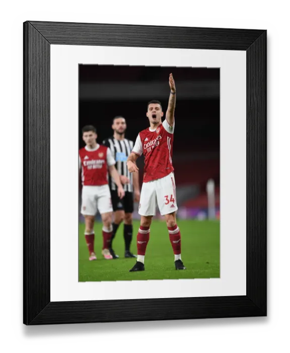 Framed Print : Arsenal's Granit Xhaka in Action against Newcastle United at Emptied Emirates Stadium (Premier League 2020-21) Framed Print : Arsenal's Granit Xhaka in Action against Newcastle United at Emptied Emirates Stadium (Premier League 2020-21)