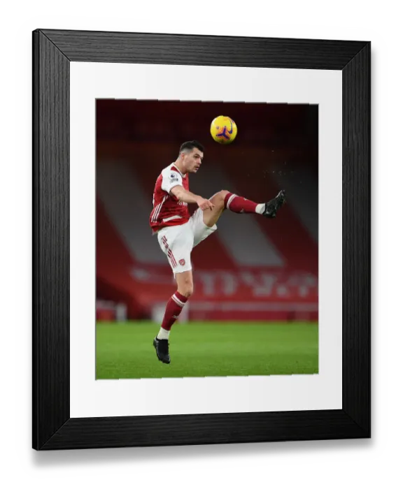 Framed Print : Granit Xhaka in Action: Arsenal vs. Newcastle United, Premier League 2020-21 (Behind Closed Doors) Framed Print : Granit Xhaka in Action: Arsenal vs. Newcastle United, Premier League 2020-21 (Behind Closed Doors)
