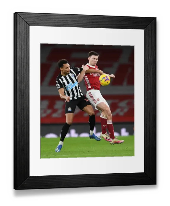 Framed Print : Arsenal vs Newcastle United: Tierney Under Pressure in Empty Emirates Stadium, Premier League 2020-21