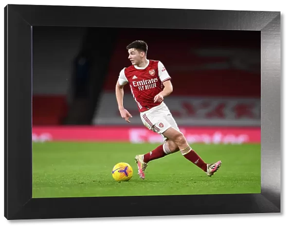 Arsenal's Kieran Tierney in Action: A Battle at Empty Emirates Against Newcastle United (2020-21)