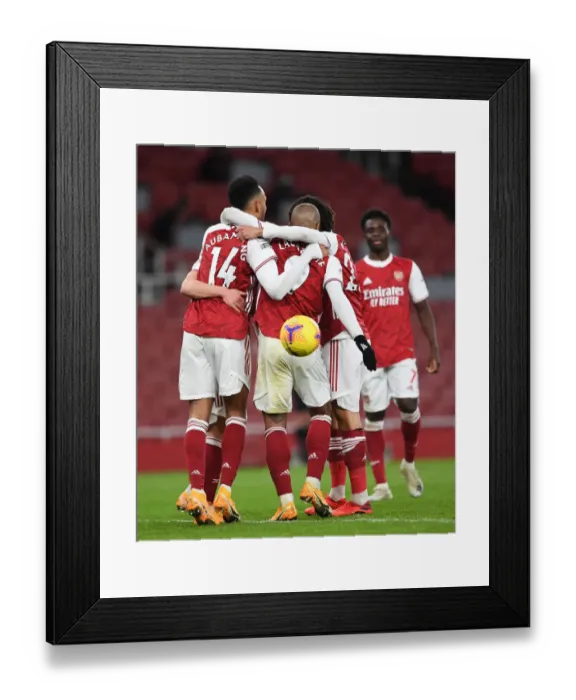 Framed Print : Arsenal's Aubameyang and Lacazette Celebrate Goals Amidst Empty Emirates Stadium Against Newcastle United (2021)