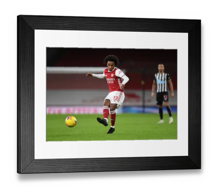 Framed Print : Willian Plays On: Arsenal vs. Newcastle United at Empty Emirates Stadium (Premier League 2020-21)