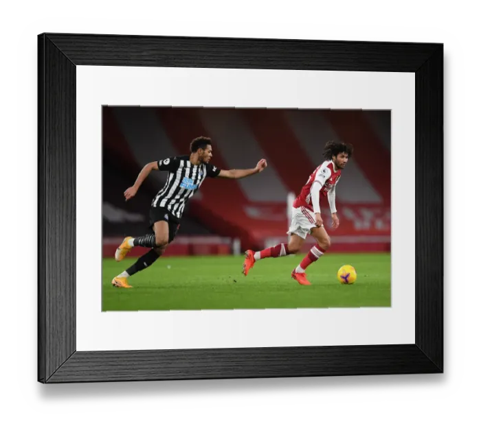 Framed Print : Arsenal vs Newcastle United: Elneny Takes on Joelinton in Empty Emirates Stadium, Premier League 2021
