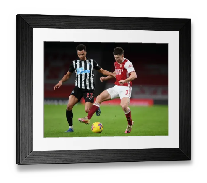 Framed Print : Arsenal's Tierney Stands Out in Empty Emirates: Arsenal vs Newcastle United, Premier League 2020-21