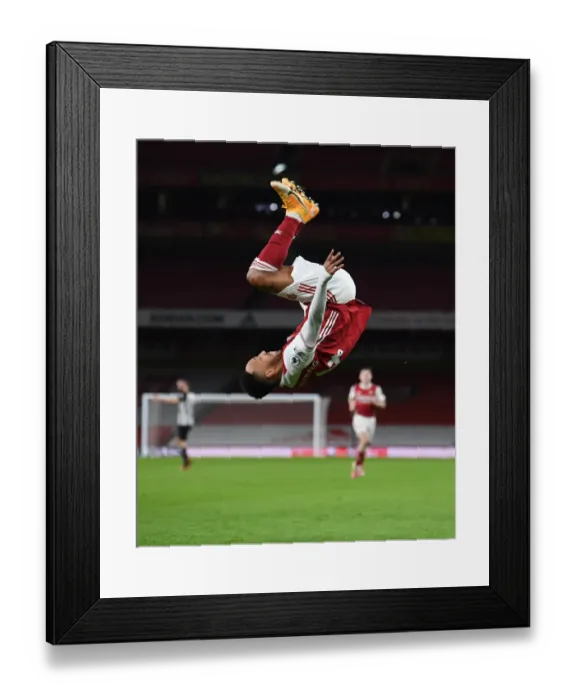 Framed Print : Arsenal's Aubameyang Scores Historic Goal in Empty Emirates Against Newcastle (2020-21) Framed Print : Arsenal's Aubameyang Scores Historic Goal in Empty Emirates Against Newcastle (2020-21)