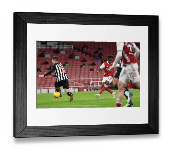 Framed Print : Bukayo Saka Scores Arsenal's Second Goal Against Newcastle United in Empty Emirates Stadium (2020-21) Framed Print : Bukayo Saka Scores Arsenal's Second Goal Against Newcastle United in Empty Emirates Stadium (2020-21)
