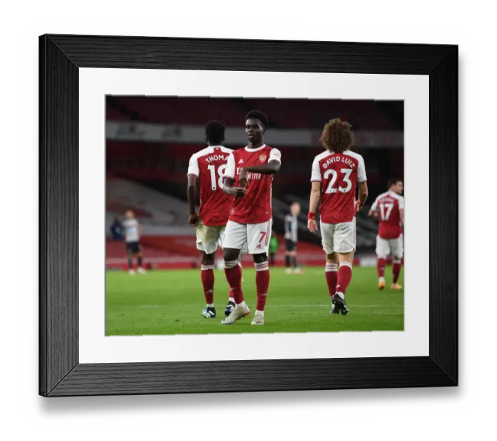 Framed Print : Bukayo Saka Scores Emptied Emirates Stadium's Second Goal Against Newcastle United, Premier League 2020-21