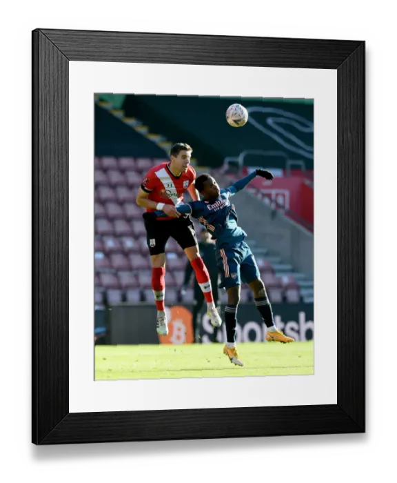 Framed Print : Empty Emirates: Arsenal vs Southampton in FA Cup Amidst Pandemic - Eddie Nketiah's Battle Framed Print : Empty Emirates: Arsenal vs Southampton in FA Cup Amidst Pandemic - Eddie Nketiah's Battle