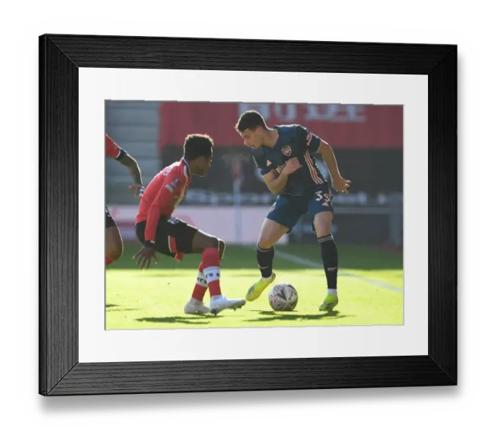 Framed Print : Arsenal's Martinelli Faces Southampton's Walker-Peters in FA Cup Clash Amid Empty Stands Framed Print : Arsenal's Martinelli Faces Southampton's Walker-Peters in FA Cup Clash Amid Empty Stands