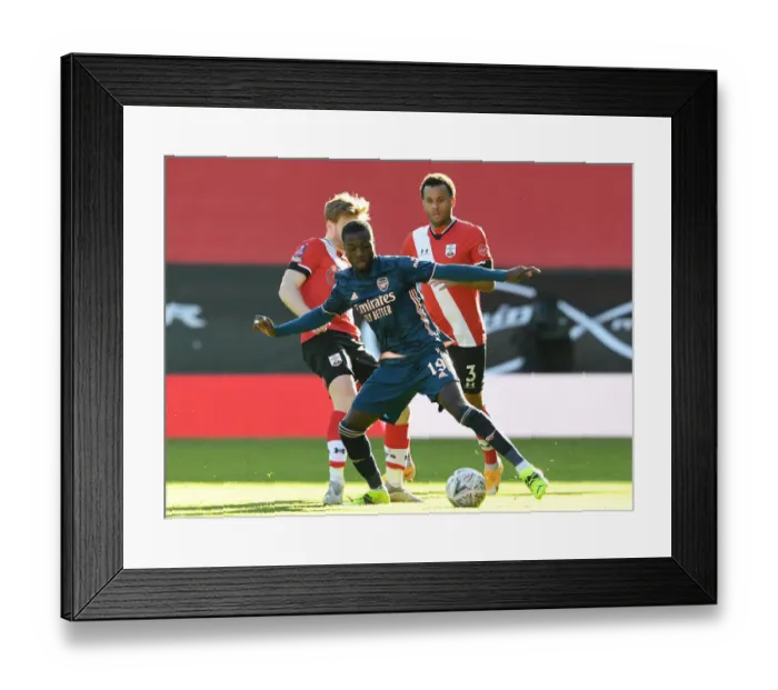Framed Print : Arsenal's Nicolas Pepe in FA Cup Action: Southampton vs Arsenal (FA Cup 4th Round 2021)