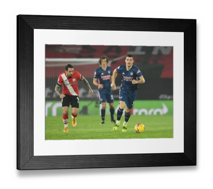 Framed Print : Xhaka Breaks Past Ings: Southampton vs Arsenal, Premier League 2021 (Behind Closed Doors) Framed Print : Xhaka Breaks Past Ings: Southampton vs Arsenal, Premier League 2021 (Behind Closed Doors)