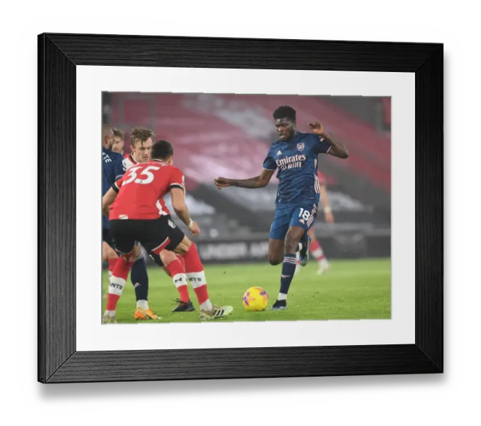 Framed Print : Thomas Partey at Empty Southampton Stadium: Arsenal's 2020-21 Premier League Match Amidst Coronavirus Restrictions Framed Print : Thomas Partey at Empty Southampton Stadium: Arsenal's 2020-21 Premier League Match Amidst Coronavirus Restrictions